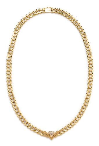 A 14 Karat Yellow Gold and Diamond Necklace,
