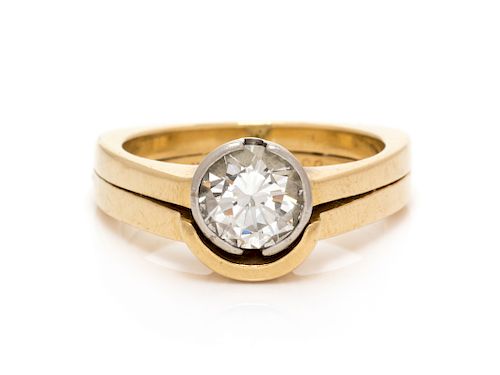 A Yellow Gold, Platinum and Diamond Solitaire Ring,