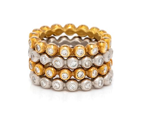 A Collection of White and Yellow Gold and Diamond Eternity Rings,