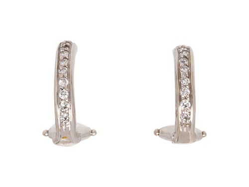 A Pair of White Gold and Diamond Earclips,