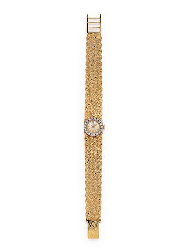 A 14 Karat Bicolor Gold and Diamond Wristwatch, Andre Bonnard,
