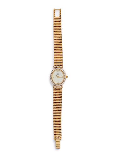 A 14 Karat Yellow Gold and Diamond Wristwatch, Baume & Mercier,