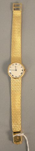 Universal 18 karat yellow gold ladies wristwatch with 18 karat mesh bracelet. lg. 7 1/8 in., 43 grams total weight