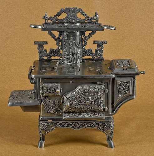 Cast iron and nickel Floral toy stove, 19 1/2''