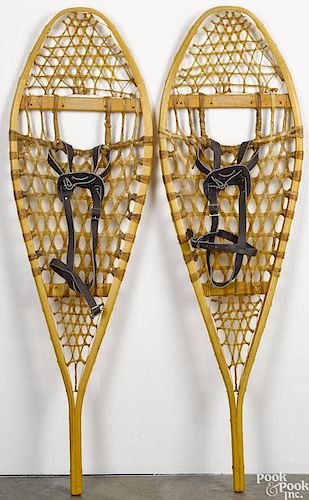 Pair of snowshoes, 20th c., 47'' l. Provenance: From the estate of Rodney Ness.