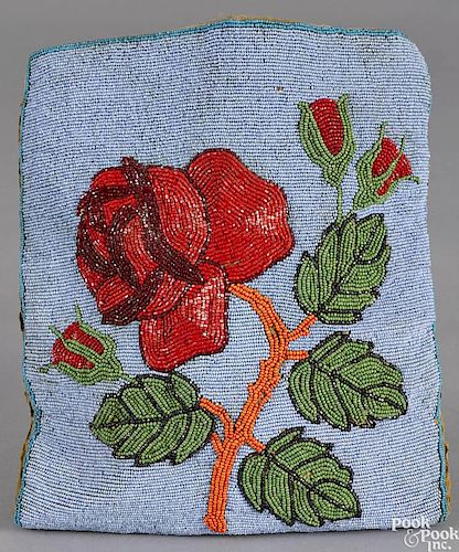 Native American Indian beaded pouch, 20th c., with rose decoration, 11'' h., 9 1/2'' w.