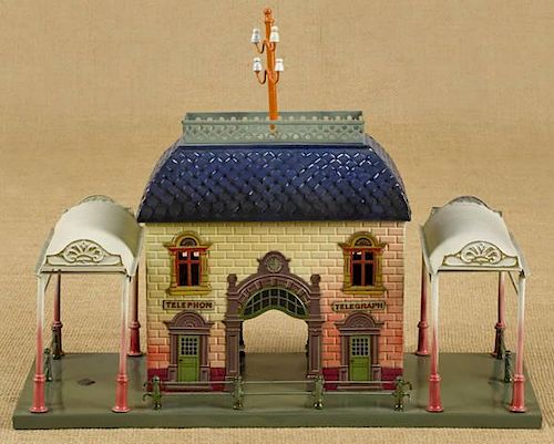 Bing painted tin train station, 12 3/4'' h., 15'' w