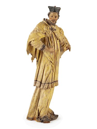 A French Carved and Polychromed Figure of a Saint