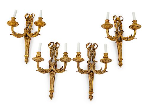 A Set of Four French Gilt Bronze Two-Light Sconces