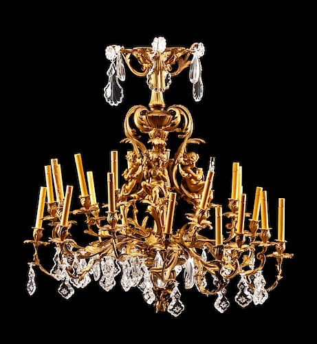 A Louis XV Style Gilt Bronze and Glass Twenty-Four-Light Chandelier