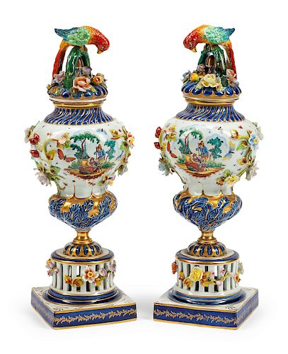 A Pair of French Porcelain Covered Urns