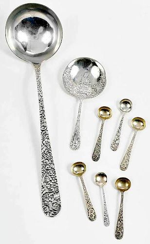 Eight Pieces Repousse Sterling Flatware