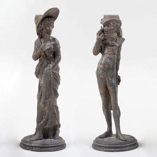 Pair of Continental Cast-Metal Figural Candlesticks