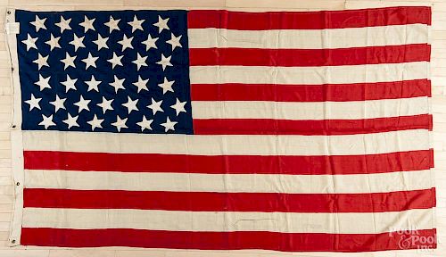 American flag, 1877-1890, with thirty-eight stars, 66'' x 120''.