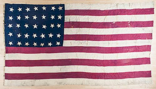 Very large American flag, 1863-1865, with thirty-five stars, having raspberry colored stripes