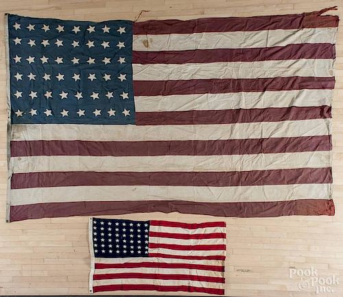 Two American flags, 1912-1959, with forty-eight stars, 80'' x 136'', and one Bull Dog Bunting