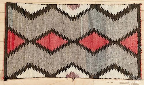 Navajo weaving with a serrated diamond pattern, 20'' x 36''.