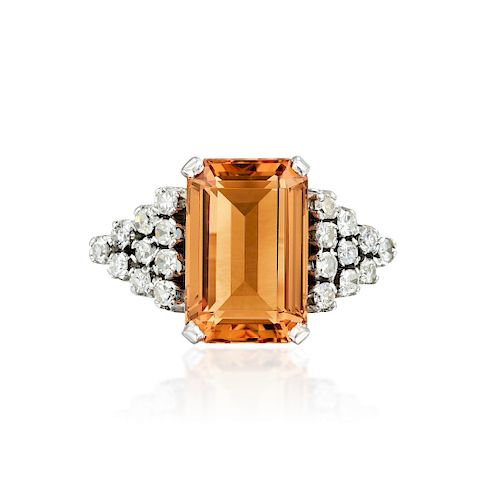 An Imperial Topaz and Diamond Ring for sale at auction on 12th ...