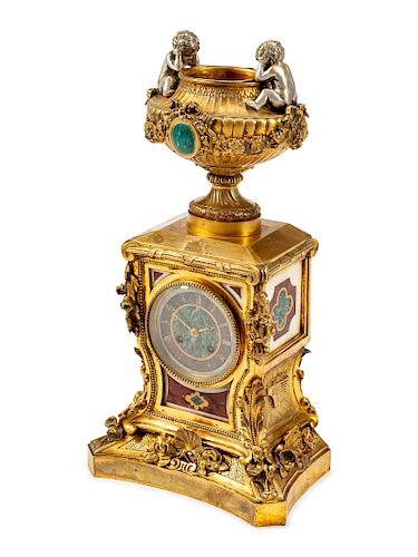 A French Gilt-Bronze and Specimen Marble Clock