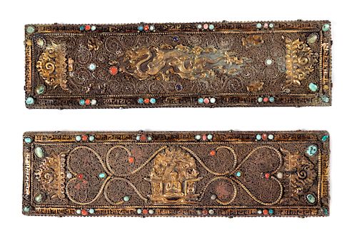 A Pair of Tibetan Parcel-Gilt and Silvered Manuscript Covers