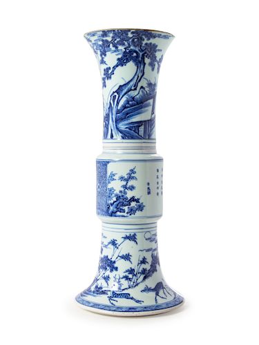 A Blue and White Porcelain Gu Vase
Height 16 in., 41 cm. 