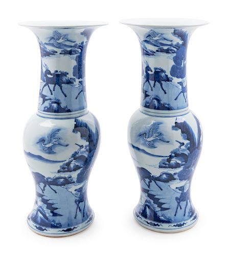 A Pair of Blue and White Porcelain Yenyen Vases
Height 18 1/2 in., 47 cm. 