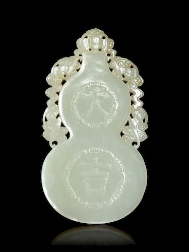 A White Jade Gourd-Form Pendant
Width 5 in., 13 cm. 