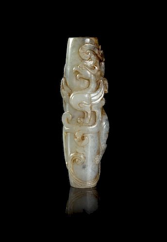 A Black and White Jade 
Chilong
 Tubular Pendant
Width 3 1/2 in., 9 cm. 