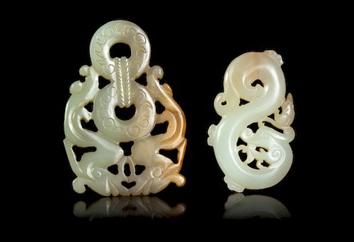 Two Reticulated Celadon Jade 'Chilong' Pendants
Larger: width 2 1/2 in., 6 cm. 