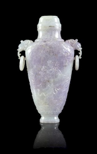 A Lavender and Pale Celadon Jadeite Doubled Dragon Handled Covered Vase
Height 6 3/4 in., 17 cm. 