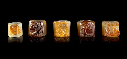 Five Carved Agate Archer's Rings
Largest Interior: diam 0 7/8 in., 2 cm. Largest Overall: diam 1 1/2 in., 4 cm. 