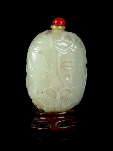 A Pale Celadon Jade Melon-Form Snuff Bottle
Height 2 1/4 in., 6 cm. 