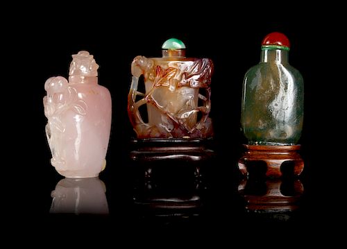 Three Hardstone Snuff Bottles
Largest: height 2 1/2 in., 6 cm. 