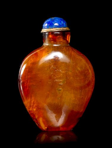 An Amber Snuff Bottle
Height 2 in., 5 cm. 