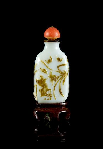 A Yellowish-Brown Overlay White Peking Glass Snuff Bottle
Height 2 1/4 in., 6 cm. 