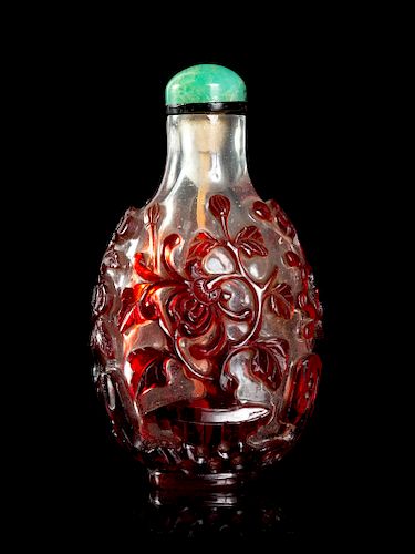 A Red Overlay Clear Class Snuff Bottle
Height 2 7/8 in., 7 cm. 