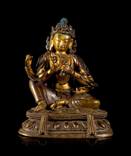 A Sino-Tibetan Gilt Bronze Figure of a Four-Armed Avalokitesvara Bodhisattva
Height 6 5/8 in., 17 cm. 