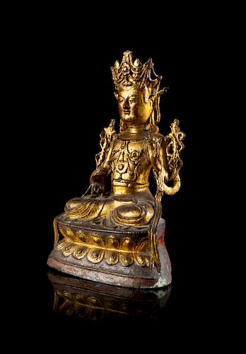 A Sino-Tibetan Gilt Bronze Figure of Maitreya Bodhisattva
Height 10 in., 25 cm. 
