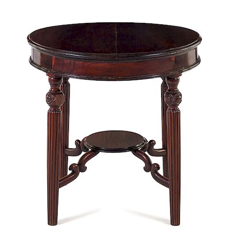 A Set of Chinese Export Hardwood Round Table and Four Chairs
Chair: height 38 1/2 in., 98 cm; Table: height 30 1/2 in., 78 cm.
