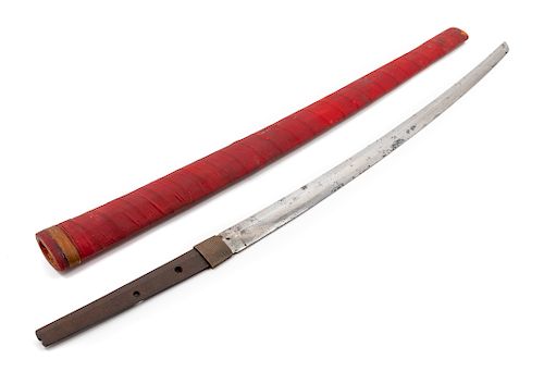 A Japanese Katana
Blade length 27 1/2 in., 70 cm. Overall length 38 in., 97 cm.