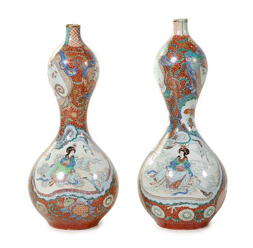 A Pair of Japanese Polychrome Enameled Porcelain Double-Gourd Vases
Height 27 in., 69 cm.
