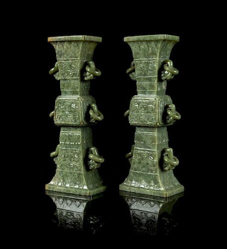 A Pair of Carved Spinach Jade Gu- Form Vases
Height of vase 12 in., 30 cm. 