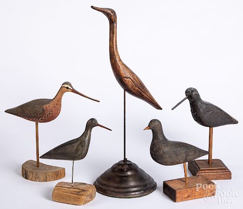 Four carved shorebird decoys, etc.