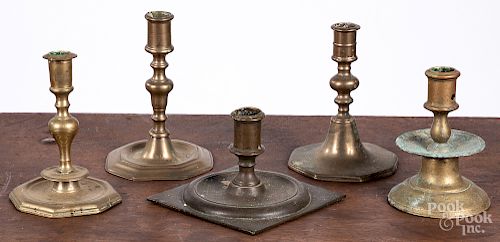 Five assorted brass candlesticks
