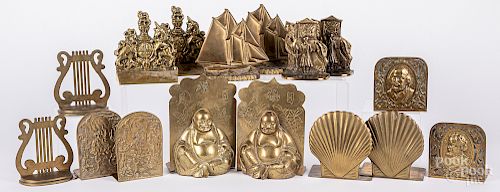 Eight pairs of brass bookends