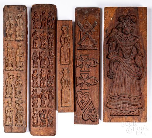 Five carved cookie boards
