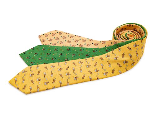 Three Hermes ties, two yellow, one green