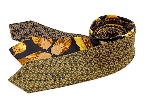 Three Hermes ties, two black with yellow pattern, one green