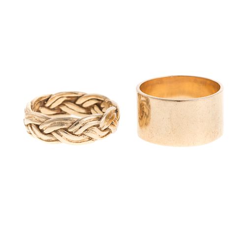 A Pair of Wide 14K Yellow Gold Bands