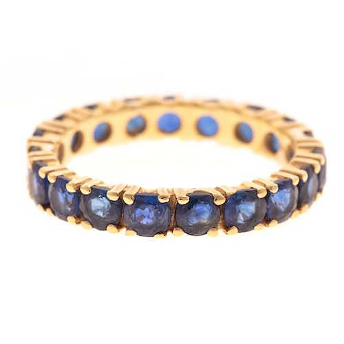 A Ladies Sapphire Eternity Band in 18K